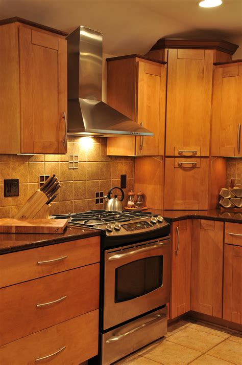 honey maple cabinets with stainless steel appliances|beautiful update for maple cabinets.